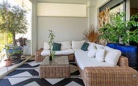 Sea Garden: Furniture, Couch, Interior Design, Living Room, Flowerpot, Flooring, Floor, Chair, Houseplant