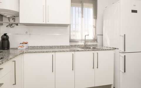 Buleria: Kitchen, Kitchen Appliance, Countertop, Cabinetry, Major Appliance, Flooring, Wood, Interior Design, Home Appliance, Furniture
