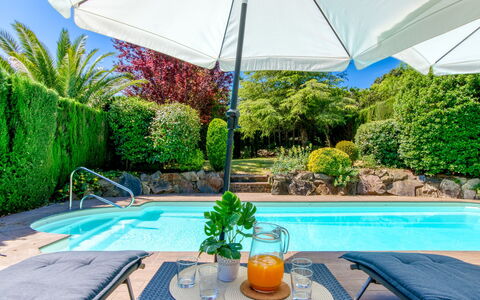 La Suntuosidad – Torremirona: Blue, Swimming Pool, Umbrella, Outdoor Furniture, Furniture, Resort, Shade, Garden, Leisure, Chair