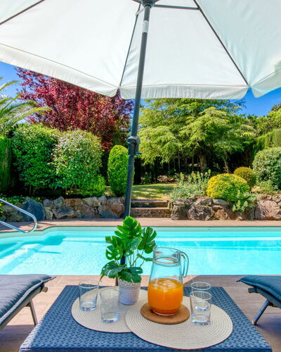 La Suntuosidad – Torremirona: Blue, Swimming Pool, Umbrella, Outdoor Furniture, Furniture, Resort, Shade, Garden, Leisure, Chair