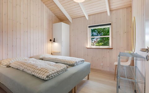 Kristine - 250M from the Sea: Wood, Interior Design, Ceiling, Bedroom, Floor, Home, Room, Hardwood, Wood Stain, Bed