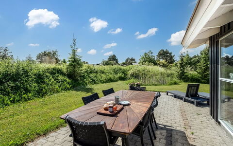 Kristine - 250M from the Sea: Sky, Land Lot, Cloud, Furniture, Garden, Shade, Chair, Landscaping, Lawn