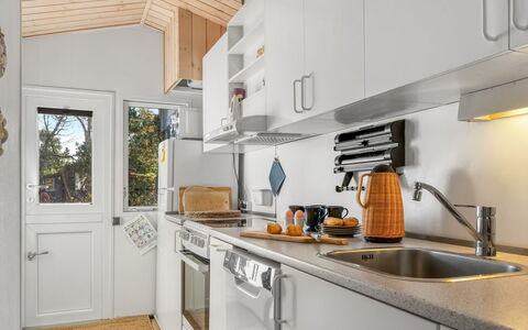 Into - 490M from the Sea: Kitchen, Kitchen Appliance, Countertop, Major Appliance, Wood, Interior Design, Kitchen Stove, Kitchen Sink, Home Appliance, Ceiling