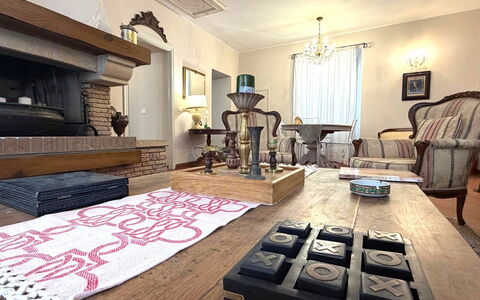 La Dimora del Leone: Furniture, Flooring, Interior Design, Floor, Wood, Living Room, Room, Lighting, Wood Flooring, Table
