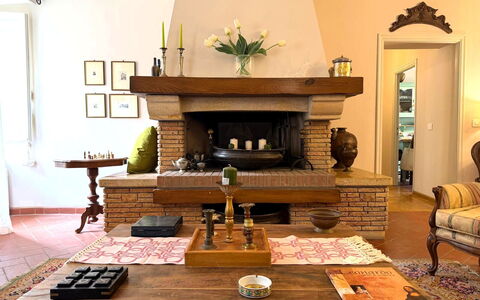 La Dimora del Leone: Furniture, Interior Design, Flooring, Wood, Hearth, Living Room, Room, Floor, Lighting, Table