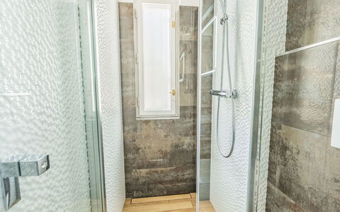 Krakovska: Flooring, Floor, Plumbing Fixture, Bathroom, Tile, Composite Material, Plumbing, Shower Door, Shower, Toilet