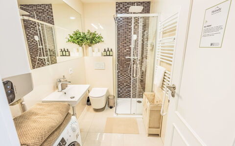 Soukenická: Interior Design, Flooring, Floor, Plumbing Fixture, Washing Machine, Plumbing, Room, Bathroom, Bathroom Cabinet, Laundry Room