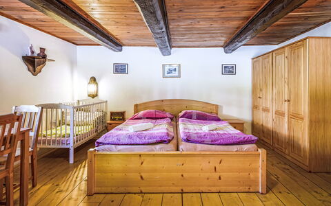 U Tří Medvědů: Wood, Interior Design, Floor, Bedroom, Flooring, Ceiling, Room, Bed, Furniture, Hardwood