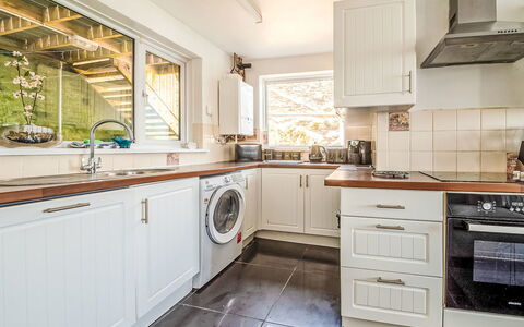 Smugglers View: Interior Design, Major Appliance, Kitchen, Flooring, Countertop, Wood, Kitchen Appliance, Cabinetry, Floor, Ceiling