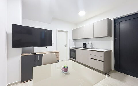 Pula 192: Flooring, Interior Design, Countertop, Furniture, Kitchen, Floor, Cabinetry, Major Appliance, Ceiling, Lighting