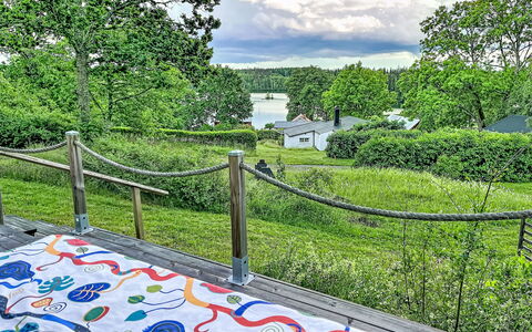 Sjöarpstugan: Garden, Shade, Lawn, Backyard, Yard, Landscaping, Park, Fence, Outdoor Furniture, Home Fencing