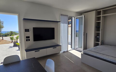 Villa Pineta della Rovere: Furniture, Apartment, Interior Design, Floor, Room, Sea, Living Room, Chair, Shelving