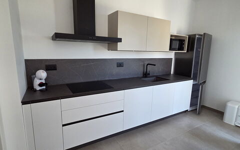 Villa Pineta della Rovere: Flooring, Countertop, Interior Design, Cabinetry, Floor, Kitchen, Wood, Furniture, Room, Home