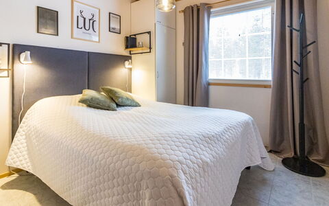 Luonnonrauha a: Bed, Bedroom, Interior Design, Bed Sheet, Furniture, Ceiling, Bedding, Textile, Linens, Lighting