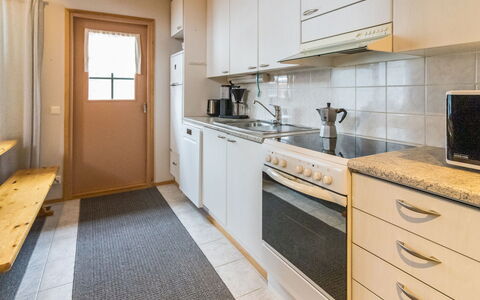 Luonnonrauha a: Flooring, Wall, Floor, Wood, Kitchen, Major Appliance, Interior Design, Countertop, Ceiling, Sink