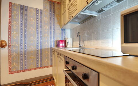 I Tre Camini: Wood, Flooring, Interior Design, Floor, Room, Lighting, Major Appliance, Countertop, Ceiling, Kitchen
