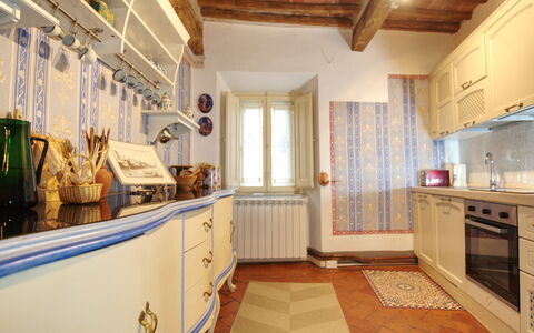 I Tre Camini: Interior Design, Wood, Flooring, Furniture, Kitchen, Floor, Cabinetry, Countertop, Room, Lighting