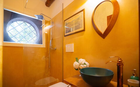 Villa Veneta - Historic Villa in the Prosecco Hill: Wall, Yellow, Interior Design, Plumbing Fixture, Orange, Flooring, Lighting, Floor, Brown, Bathroom