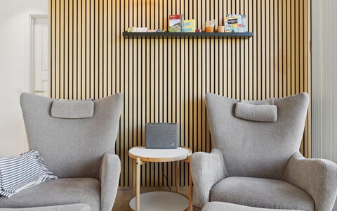 Eliene - 500M from the Sea: Furniture, Interior Design, Chair, Shelving, Living Room, Wood Stain, Shelf, Design, Armrest, Wallpaper