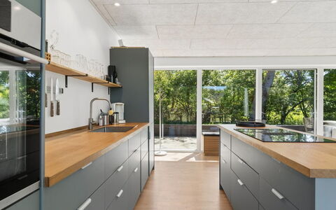 Eliene - 500M from the Sea: Kitchen, Countertop, Flooring, Kitchen Appliance, Wood, Cabinetry, Furniture, Interior Design, Major Appliance, Ceiling