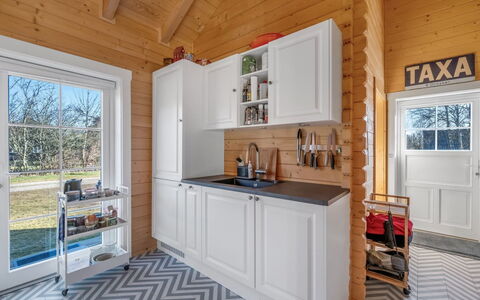 Taija - 200M to the Fjord: Wood, Kitchen, Flooring, Interior Design, Major Appliance, Kitchen Appliance, Floor, Furniture, Room, Cabinetry