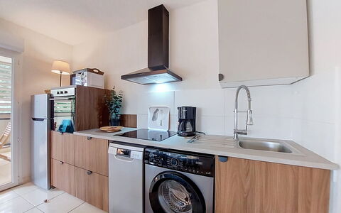 L'Etoile du Sud: Major Appliance, Kitchen Appliance, Kitchen, Flooring, Countertop, Interior Design, Cabinetry, Wood, Floor, Home Appliance