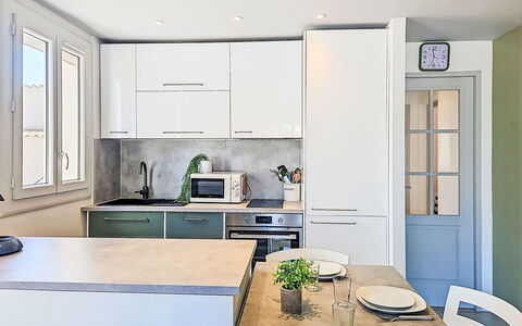 Croix du Sud: Furniture, Kitchen, Countertop, Kitchen Appliance, Cabinetry, Interior Design, Flooring, Major Appliance, Wood, Floor