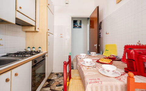 A Cà du Piero: Interior Design, Flooring, Wood, Floor, Major Appliance, Room, Furniture, Ceiling, Kitchen, Apartment