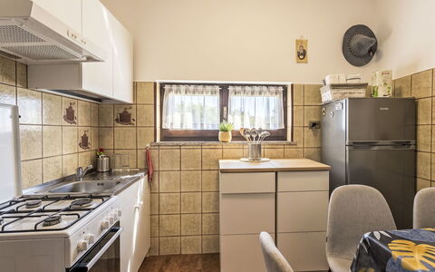 Francesco: Kitchen, Major Appliance, Kitchen Appliance, Countertop, Interior Design, Furniture, Wood, Flooring, Cabinetry, Floor