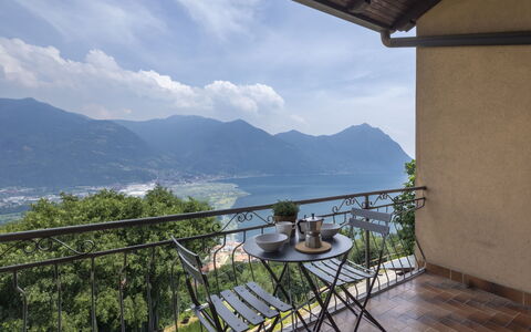 Ortigara Terrace View: Furniture, Hill, Mountain Range, Coastal And Oceanic Landforms, Chair, Lake, Coast, Sea, Hill Station, Ridge