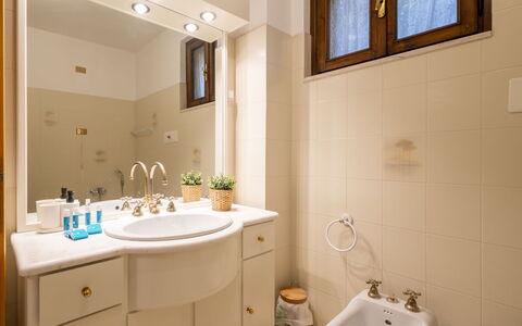 Ortigara Terrace View: Bathroom Sink, Bathroom, Plumbing Fixture, Sink, Interior Design, Tap, Mirror, Bathroom Cabinet, Flooring, Plumbing