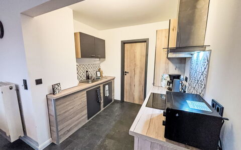 Ferienhuuske Boden: Wood, Flooring, Countertop, Floor, Furniture, Interior Design, Cabinetry, Room, Kitchen, Ceiling