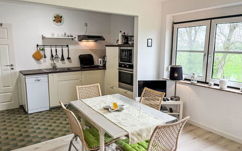 Friesenwohnung: Furniture, Interior Design, Flooring, Kitchen, Floor, Wood, Countertop, Kitchen Appliance, Chair, Kitchen & Dining Room Table