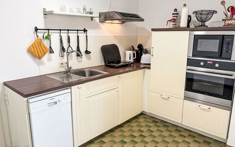 Friesenwohnung: Kitchen Appliance, Kitchen, Major Appliance, Countertop, Wood, Cabinetry, Kitchen Stove, Flooring, Stove, Kitchen Sink