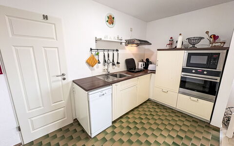Friesenwohnung: Flooring, Kitchen, Kitchen Appliance, Floor, Wood, Major Appliance, Kitchen Stove, Interior Design, Countertop, Cabinetry