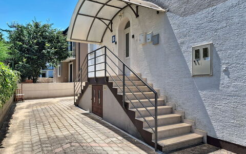 Emma: Stairs, Handrail, Door, Baluster, Metal, Balcony, Porch, Daylighting, Home Door