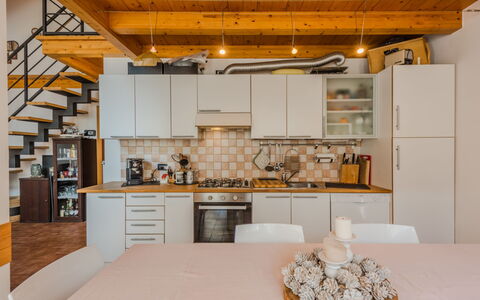 Giglio: Kitchen, Furniture, Interior Design, Flooring, Countertop, Kitchen Appliance, Floor, Wood, Major Appliance, Ceiling