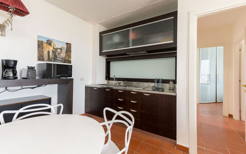 Al Porto: Interior Design, Kitchen, Flooring, Countertop, Wood, Furniture, Ceiling, Floor, Kitchen Appliance, Room