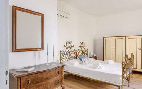 Casabianca: Interior Design, Flooring, Wall, Furniture, Floor, Wood, Bedroom, Lighting, Room, Bed