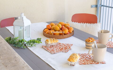 Casabianca: Tableware, Furniture, Table, Serveware, Flowerpot, Food, Tablecloth, Fruit, Dishware, Linens
