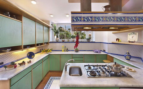 Villa Clara: Kitchen, Countertop, Interior Design, Kitchen Appliance, Kitchen Stove, Major Appliance, Flooring, Cabinetry, Lighting, Gas Stove