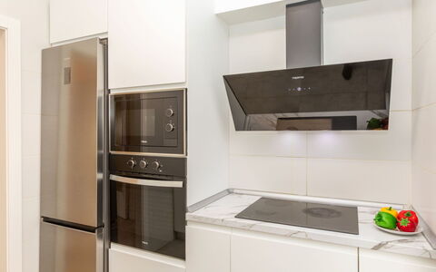 Ribera: Kitchen Appliance, Kitchen, Major Appliance, Interior Design, Flooring, Wall, Cabinetry, Countertop, Home Appliance, Wood