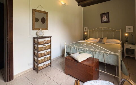 Villa Simona: Furniture, Interior Design, Bed, Flooring, Floor, Bedroom, Ceiling, Wood, Room, Bedding