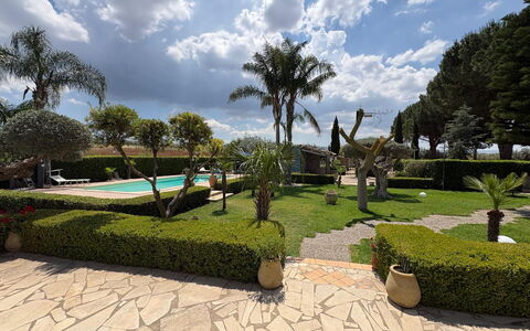 Villa Simona: Shrub, Garden, Landscape, Resort, Swimming Pool, Landscaping, Lawn, Shade, Hacienda