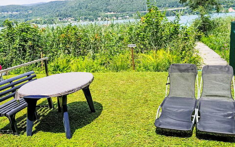 Velden am Wörthersee 39: Furniture, Outdoor Furniture, Outdoor Table, Table, Chair, Garden, Lawn, Shade, Bench