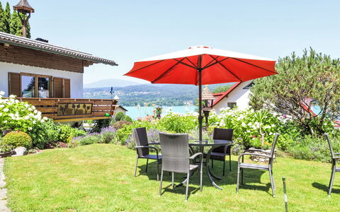 Velden am Wörthersee 39: Shrub, Furniture, Garden, Outdoor Furniture, Lawn, Umbrella, Landscaping, Shade, Outdoor Table