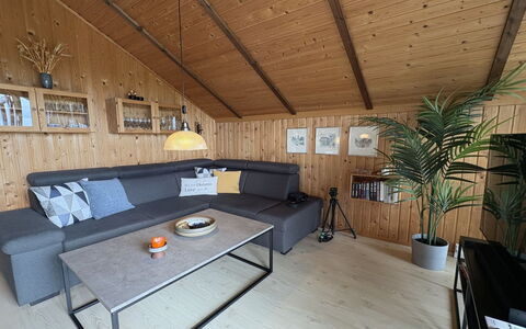 Kalervo - 2.9Km to the Fjord: Furniture, Wood, Interior Design, Flooring, Couch, Floor, Living Room, Ceiling, Wood Flooring, Room
