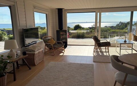 Raadengaard - 400M from the Sea: Furniture, Table, Chair, Floor, Kitchen & Dining Room Table, Wood Flooring, Wood Stain, Hardwood, Coffee Table, Living Room