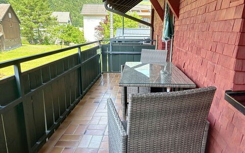 Mellau Appartments: Furniture, Chair, Outdoor Furniture, Porch, Outdoor Table, Balcony, Shade, Hardwood, Wood Stain, Deck