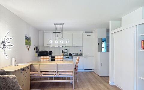 Mellau Appartments: Furniture, Interior Design, Flooring, Kitchen, Floor, Countertop, Ceiling, Wood, Light Fixture, Cabinetry